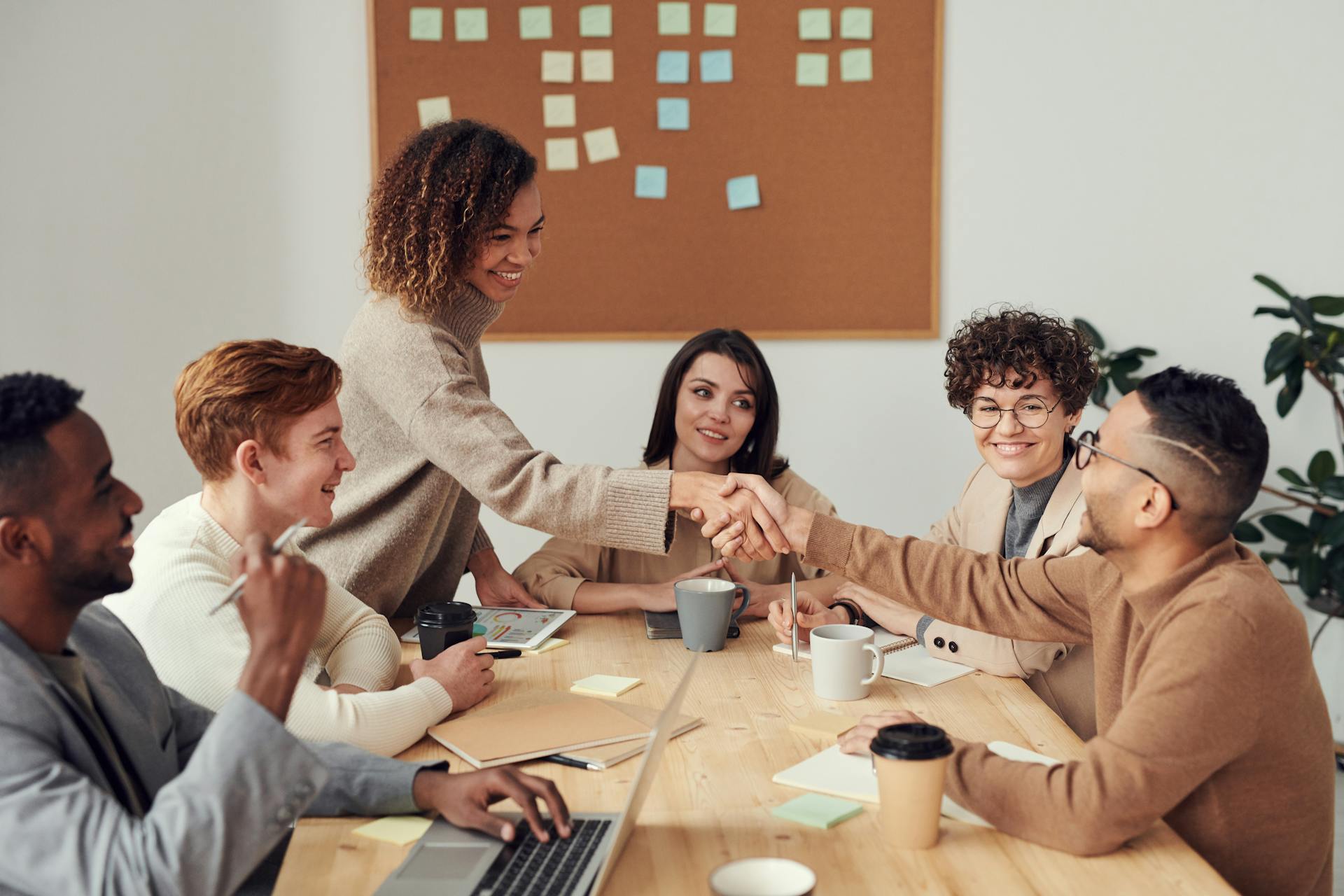 A small team discussing product direction around a table